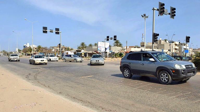 Libyan drivers in Tripoli ignore a curfew aimed at stopping the spread of coronavirus (AFP photo)