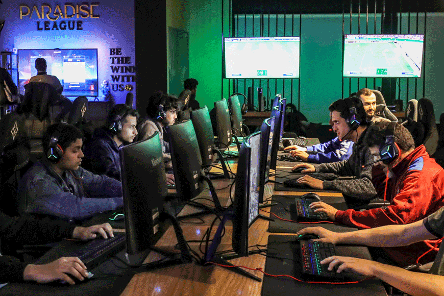 In this photo taken on March 27 youths play at a video gaming centre in Libya’s capital Tripoli (AFP photo)