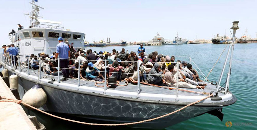 Migrants arrive at a naval base after being rescued by Libyan coast guards in Tripoli, Libya, on June 29 (Reuters photo)