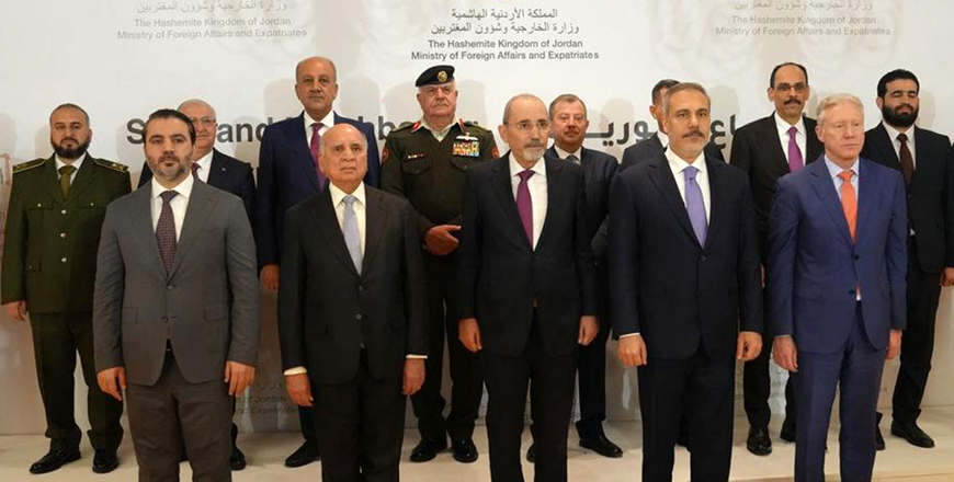 This handout picture released by Jordan's Foreign Ministry shows (front L to R) Syria's interim foreign minister Asaad Shaibani, Iraq's Foreign Minister Fuad Hussein, Jordan's Foreign Minister Ayman Safadi, Turkey's Foreign Minister Hakan Fidan, and Lebanon's Foreign Minister Youssef Rajji posing for a family photo during the Syria and Neighbouring Countries meeting in Amman on March 9, 2025 (AFP photo)