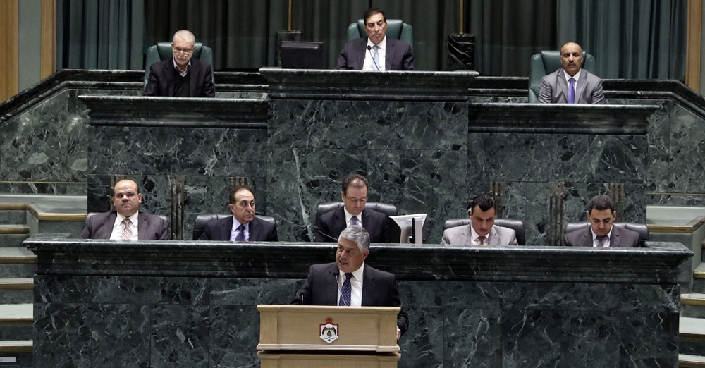 Finance Minister Omar Malhas details the 2017 draft budget in a speech before the Lower House on Wednesday (Photo by Osama Aqarbeh)