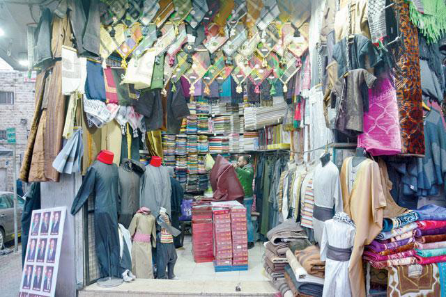 The clothing, footwear and fabric sector consists of roughly 4,000 importers and 14,000 retailers, employing around 68,000 workers, 98 per cent of whom are Jordanian, according to a sector representative (File photo)