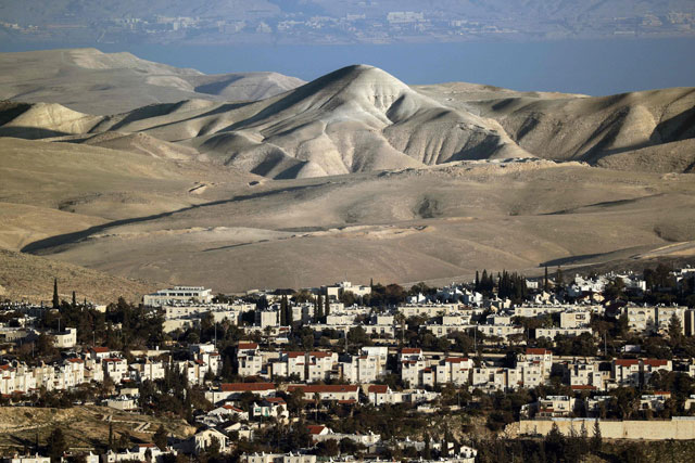 A photo taken on Monday from Jerusalem shows the Israeli settlement of Maale Adumim in the Palestinian West Bank with the mountains at the east of the Jordan River in the background (AFP photo by Thomas Coex)