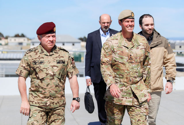 His Majesty King Abdullah attends a military exercise performed by one of the units of the Australian army in Sydney on Friday (Photo courtesy of Royal Court)