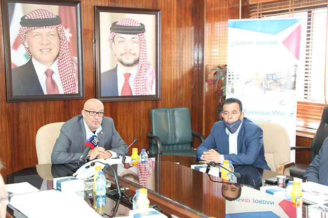 Minister of Water and Irrigation Raed Abul Saud speaks at the signing of an agreement between the Water Ministry and  three Jordanian companies specialised in reducing water loss on Thursday (Photo courtesy of Miyahuna Facebook page)