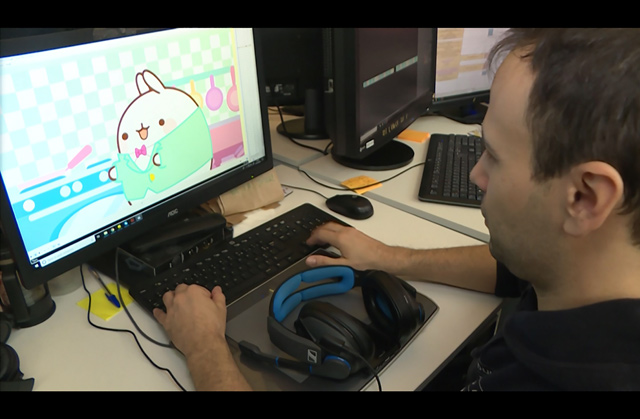 A screen grab taken from an AFP video shows an editor working on an animation of the white rabbit called Molang at the French animation studio Millimages in Paris on Monday (AFP photo by Natalie Handel)