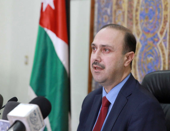 Government Spokesperson Mohammad Momani speaks at a press conference in Amman on Sunday  (Petra photo)