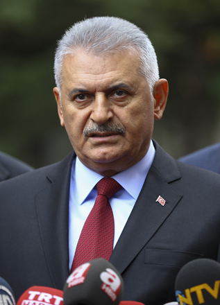 Turkish Prime Minister Binali Yildirim speaks to the press following the Friday prayer at Hudaverdi Mosque in Ankara, Turkey, on Friday (Anadolu Agency photo)