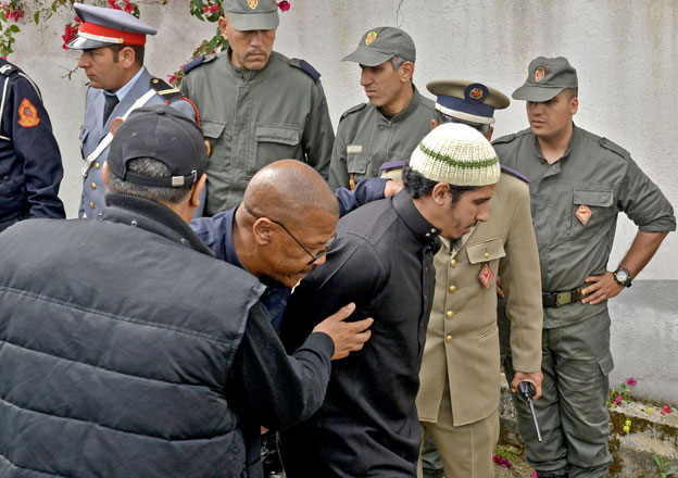 In this file photo taken on May 2 a suspect in the murder of two Scandinavian hikers arrives for his trial at a Moroccan court in Sale near the capital Rabat (AFP photo)