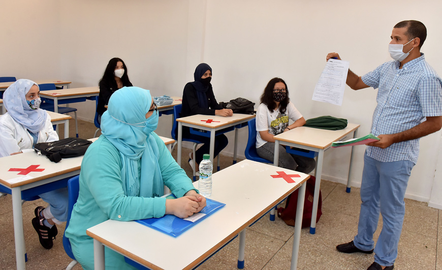 Students attend the first day of classes amid measures put in place by Moroccan authorities in bid to stop the spread of COVID-19, in the city of Sale, on Monday (AFP photo)