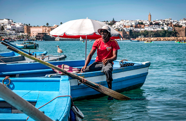 A boatman sits in his boat in the Bou Regreg River between the city of Sale and Morocco's capital Rabat, on Sunday (AFP photo)
