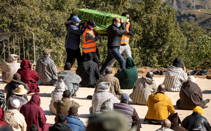 Moroccans carry the body of five-year-old Rayan Oram during his funeral in the village of Ighrane in Morocco’s rural northern province of Chefchaouen, on Monday  (AFP photo)