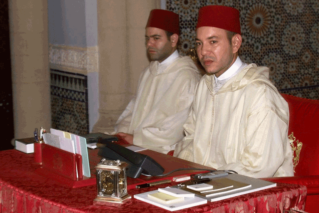 King of Morocco Mohammed VI, chairs his first Cabinet meeting at the royal palace in the capital Rabat as his brother, Prince Moulay Rachid (left), sits next to him, on August 2, 1999 (AFP photo)