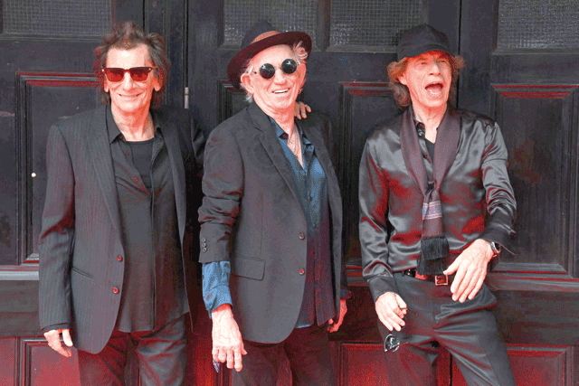 Ron Wood, Keith Richards and Mick Jagger of legendary British rock band, The Rolling Stones pose as they arrive to attend a launch event for their new album, ‘Hackney Diamonds’ at Hackney Empire in London, on Wednesday (AFP photo)