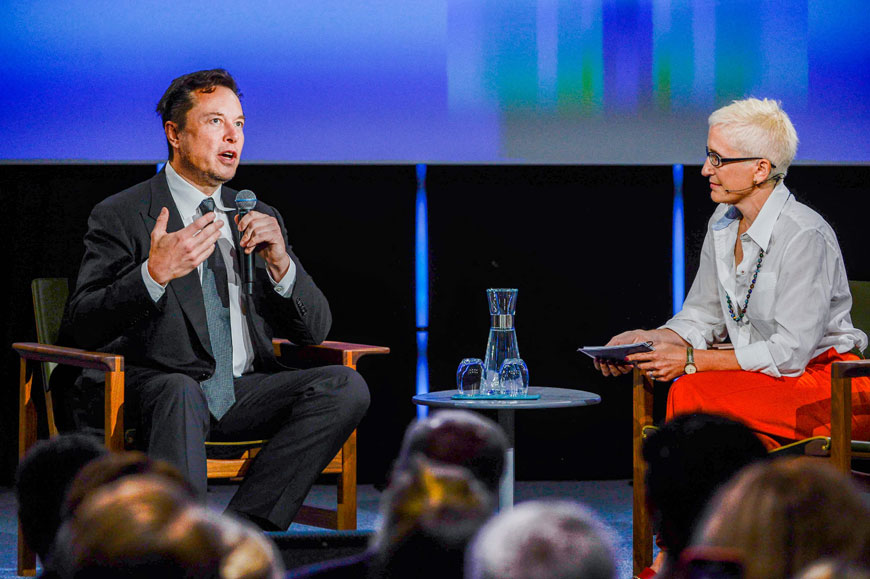 Tesla CEO Elon Musk speaks with presenter Xenia Wicket at the Offshore Northern Seas 2022 (ONS) meeting in Stavanger, Norway, on Monday (AFP photo)