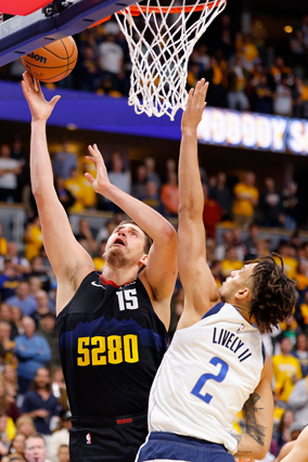 Nikola Jokic #15 of the Denver Nuggets goes to the basket against the Dallas Mavericks in the first quarter during the NBA In-Season Tournament game at Ball Arena on Friday in Denver, Colorado (AFP photo)