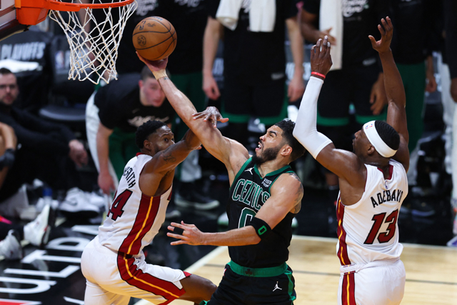 Jayson Tatum #0 of the Boston Celtics drives to the basket against Haywood Highsmith #24 of the Miami Heat during the second quarter in game three of the Eastern Conference First Round Playoffs at Kaseya Centre on Saturday in Miami, Florida (AFP photo)