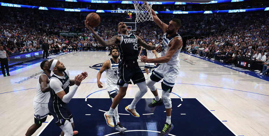 P.J. Washington #25 of the Dallas Mavericks attempts a shot against Rudy Gobert #27 of the Minnesota Timberwolves during the fourth quarter in Game Four of the Western Conference Finals at American Airlines Centre on Wednesday in Dallas, Texas (AFP photo)