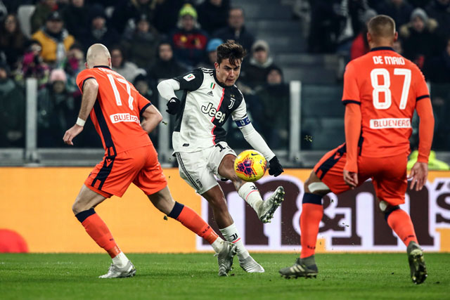 Juventus’ Argentine forward Paulo Dybala shoots to score his team’s third goal during the Italian Cup (Coppa Italia) round of 16 football match Juventus vs Udinese on Wednesday at the Juventus Stadium in Turin (AFP photo by Isabella Bonotto)