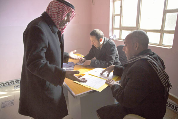 An Iraqi man waits to get official documents at the Qayyarah tribunal, in the town on the Tigris River south of the city of Mosul, on Tuesday (AFP photo)