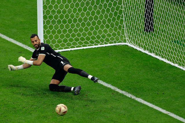 Jordan's goalkeeper #01 Yazeed Abulaila fails to save a penalty shot to concede a third goal during the AFC Qatar 2023 Asian Cup final football match between Jordan and Qatar at the Lusail Stadium in Lusail, north of Doha, on Saturday (AFP photo)