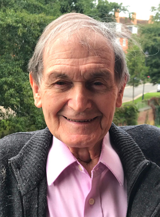 A handout photo released by Oxford University shows Roger Penrose posing on Tuesday in Oxford after winning the Nobel Physics Prize  (AFP photo)