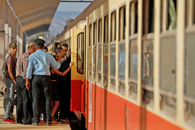 People get in a train at a railway station in Damascus, Syria, on September 7 (Reuters photo)