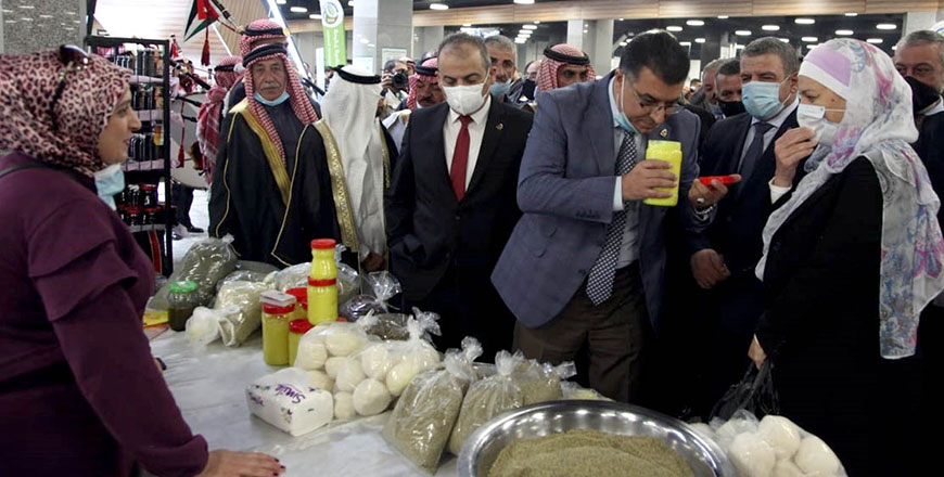 HRH Princess Basma Bint Ali and Agriculture Minister Khalid Hneifat tour a stall during the inauguration of the 21st National Olive Festival in Amman on Thursday (Petra photo)