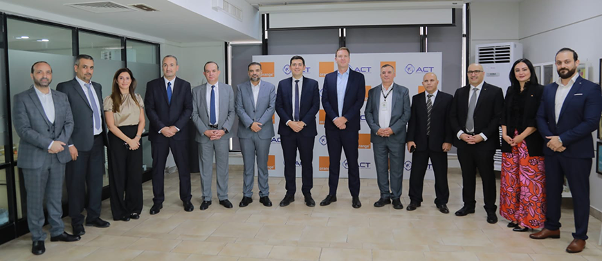 Guests pose for a photo during the signing of an agreement between Orange Jordan and Aqaba Container Terminal (Photo courtesy of Orange)