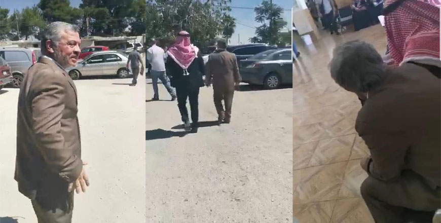 His Majesty King Abdullah is seen walking in the parking lot of the north Amman Department of Land and Survey during an undercover visit recently (JT photo)