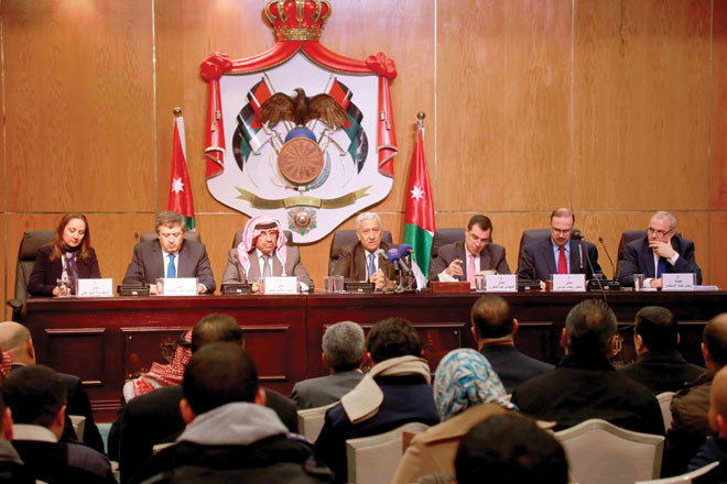 Prime Minister Abdullah Ensour and several members of his Cabinet hold a press conference at the Royal Cultural Centre in Amman on Sunday (Photo by Sahem Rababah)