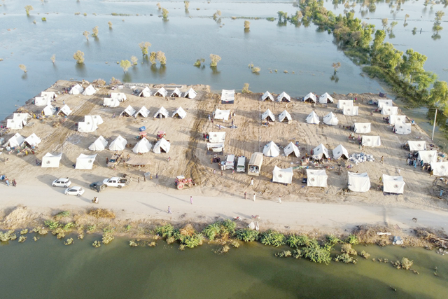 This aerial photograph shows makeshift tents for people displaced due to the floods after heavy monsoon rains at Sohbatpur in Jaffarabad district of Balochistan province on Sunday (AFP photo)