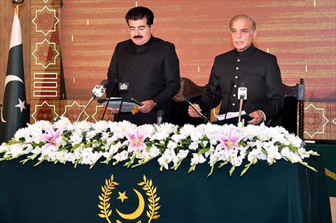 This handout photograph, released by the Press Information Department on Monday, shows acting Pakistan's President Muhammad Sadiq Sanjrani (left) administering oath to Shehbaz Sharif as Prime Minister of Pakistan at the President House in Islamabad (AFP photo)