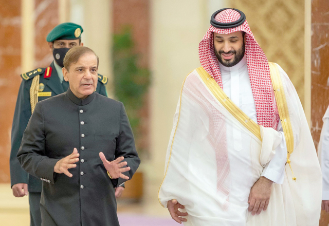 This handout photo provided by the Saudi Royal Palace shows Saudi Arabia’s Crown Prince Mohammed Bin Salman (right) welcoming Pakistani Prime Minister Shehbaz Sharif in Jeddah, on Saturday (AFP photo)
