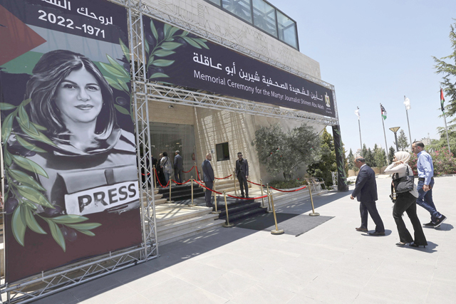 Mourners arrive for a memorial ceremony for Shireen Abu Akleh to mark the 40th day of the killing of Al Jazeera journalist, in the West Bank city of Ramallah on Sunday (AFP photo)