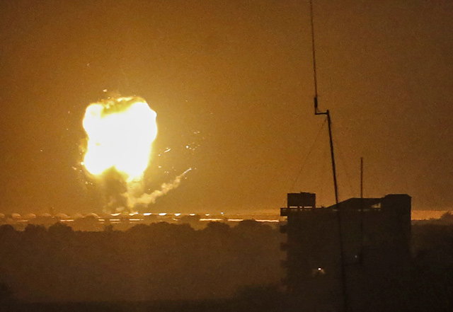 A photo taken in Rafah in the southern Gaza Strip, on Saturday, shows an explosion following an air strike by Israel (AFP photo)