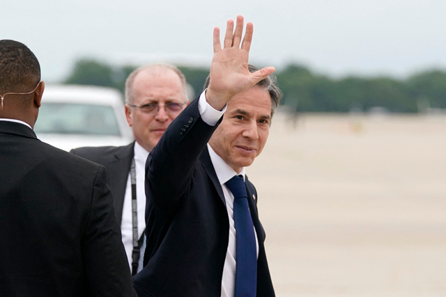 US Secretary of State Antony Blinken waves as he departs Andrews Air Force Base, Maryland, on Monday (AFP photo)