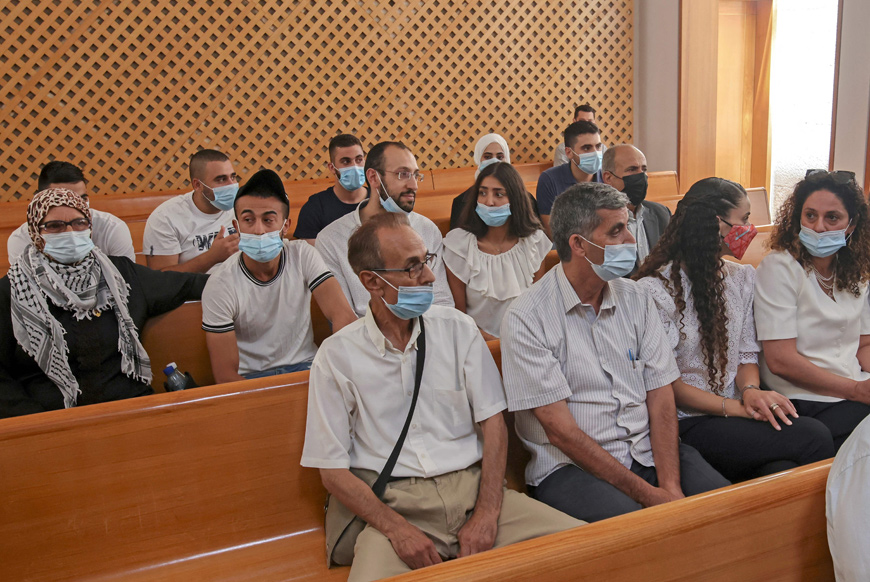 Palestinian residents of the Sheikh Jarrah neighbourhood attend a hearing at Israel’s supreme court in East Jerusalem on Monday (AFP photo)