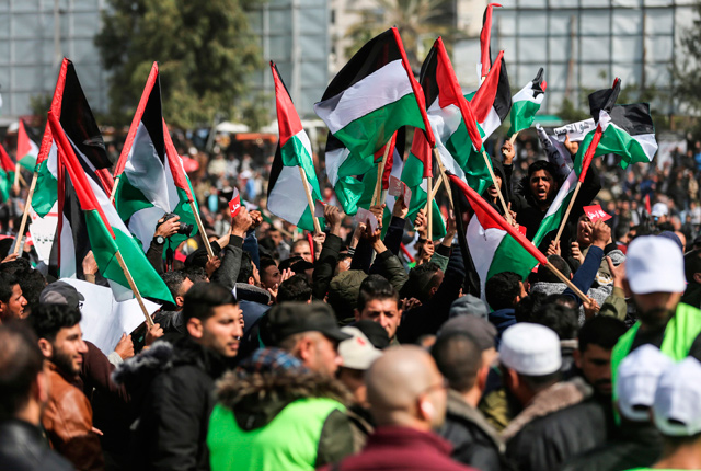 Palestinian demonstrators attend a protest, in Gaza City,  demanding Palestinian President Mahmoud Abbas to step down, on Sunday  (AFP photo)