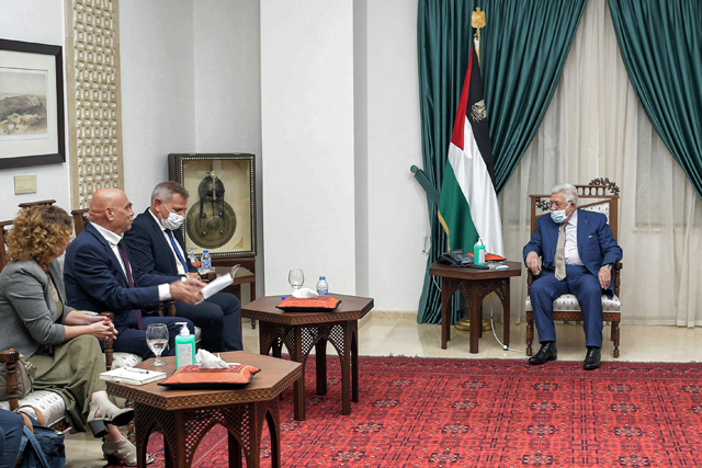 A handout photo provided by the Palestinian Authority’s press office on Sunday shows Palestinian President Mahmoud Abbas (right) meeting with Israel’s Ministers of Health Nitzan Horowitz (third left), Regional Cooperation Issawi Frej (second left) and deputy Michal Rozin, in Ramallah (AFP photo)