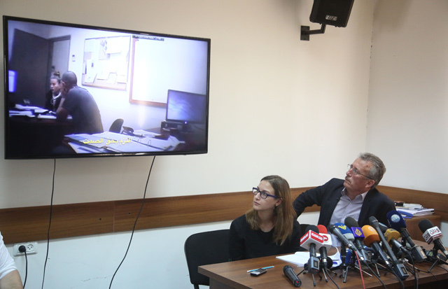 Basil Tamimi (right), father of 17-year-old Palestinian Ahed Tamimi, who was taken into custody by Israeli soldiers, holds a press conference with released excerpts from a video of his daughter exposing verbal harassment by an Israeli intelligence officer in Ramallah, West Bank, on Monday (Anadolu Agency photo)