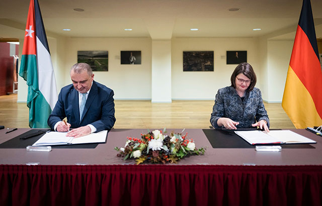 Minister of Planning and International Cooperation Nasser Shraideh and German State Minister in the Federal Ministry for Economic Cooperation and Development Maria Flachsbarth sign the minutes of the meeting of the annual Jordanian-German discussions on Wednesday (Photo courtesy of Planning Ministry)