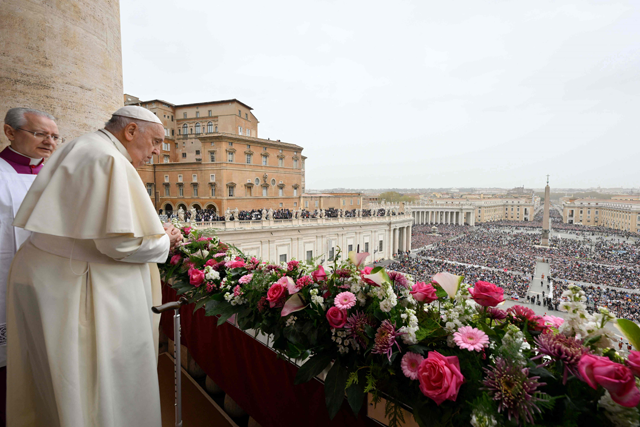 This photo taken and handout on Sunday by The Vatican Media shows Pope Francis during the Easter ‘Urbi et Orbi’ message and blessing to the City and the World from the central loggia of St Peter’s basilica in The Vatican (AFP photo)