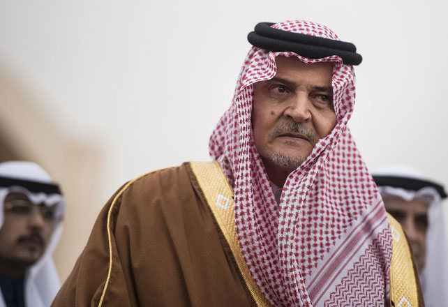 In this January 5, 2014 photo, Saudi foreign minister at the time Prince Saud Al Faisal waits to greet US Secretary of State John Kerry upon his arrival at King Khalid International Airport in Riyadh, Saudi Arabia (AP photo) 