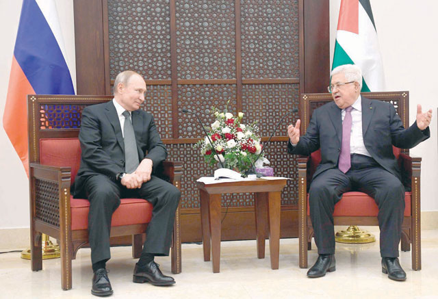 Russian President Vladimir Putin meets with Palestinian President Mahmoud Abbas in the West Bank town of Bethlehem on Thursday (AFP photo)