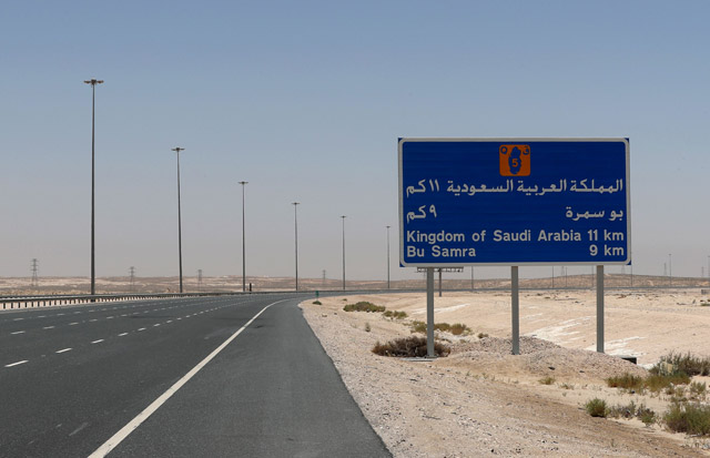 This file photo taken on June 20, 2017 shows a road sign near the Bu Samra border crossing between Qatar and Saudi Arabia (AFP photo)
