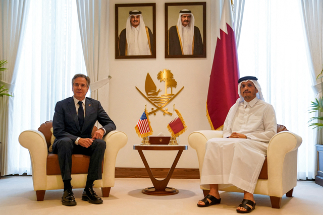Qatar's Prime Minister and Foreign Affairs Minister Sheikh Mohammed Bin Abdulrahman Bin Jassim Al Thani receives US Secretary of State Antony Blinken in Doha on Thursday (AFP photo)