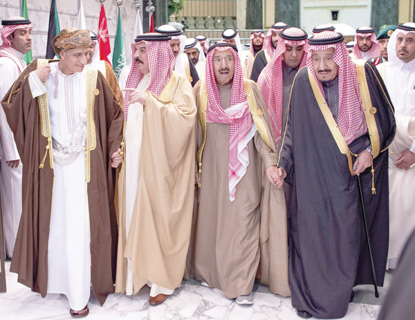 This handout photo provided by the Saudi Royal Palace shows from left to right: Omani Deputy Prime Minister Fahd Bin Mahmoud Al Said, Bahrain's King Hamad Bin Isa Al Khalifa, Kuwaiti Emir Sheikh Sabah Al Ahmad Al Jaber Al Sabah and Saudi Arabia's King Salman Bin Abdul Aziz and Qatar's Prime Minister Abdullah Bin Nasser Bin Khalifa Al Thani attending the 40th Gulf Cooperation Council summit held at the Saudi capital Riyadh on Tuesday (AFP photo)