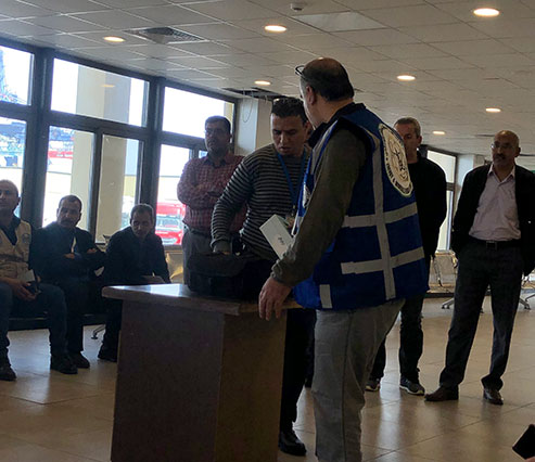 Officials demonstrate radiation detection methods at the passengers’ terminal in Aqaba on Thursday during a media tour organised by the  EMRC (Photo by Batool Ghaith)