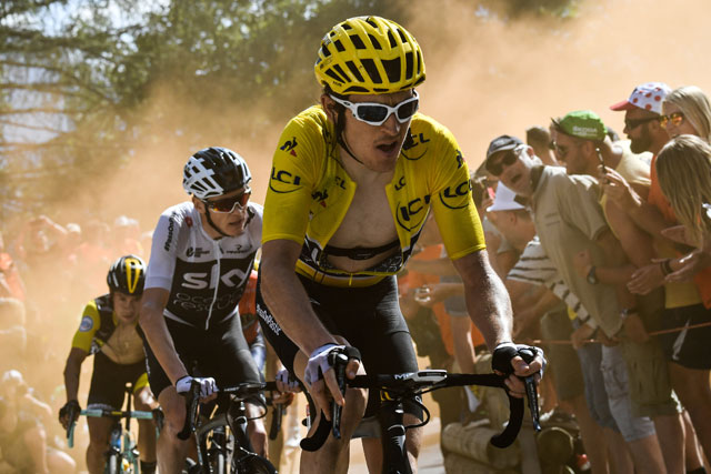 The 175.5-km Stage 12 from Bourg-Saint-Maurice Les Arcs to I’Alpe d’Huez, on Thursday, Great Britain’s Geraint Thomas, wearing the overall leader’s yellow jersey, and Great Britain’s Christopher Froome ride through the so-called ‘Dutch Corner’ in the ascent to l’Alpe d’Huez (Reuters photo)